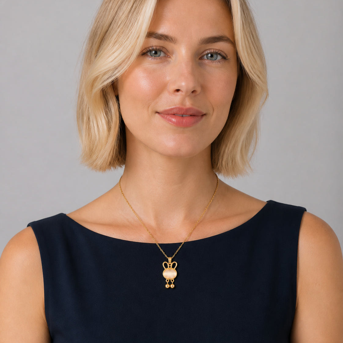 Opal‑Inlaid Bunny Bell Pendant Necklace
